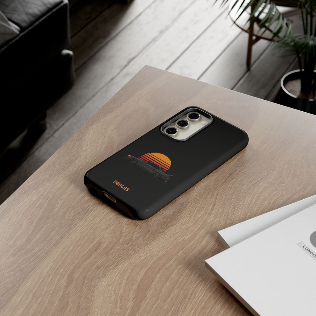 Vintage Black Sports Car Phone Case — Retro Sunset Design