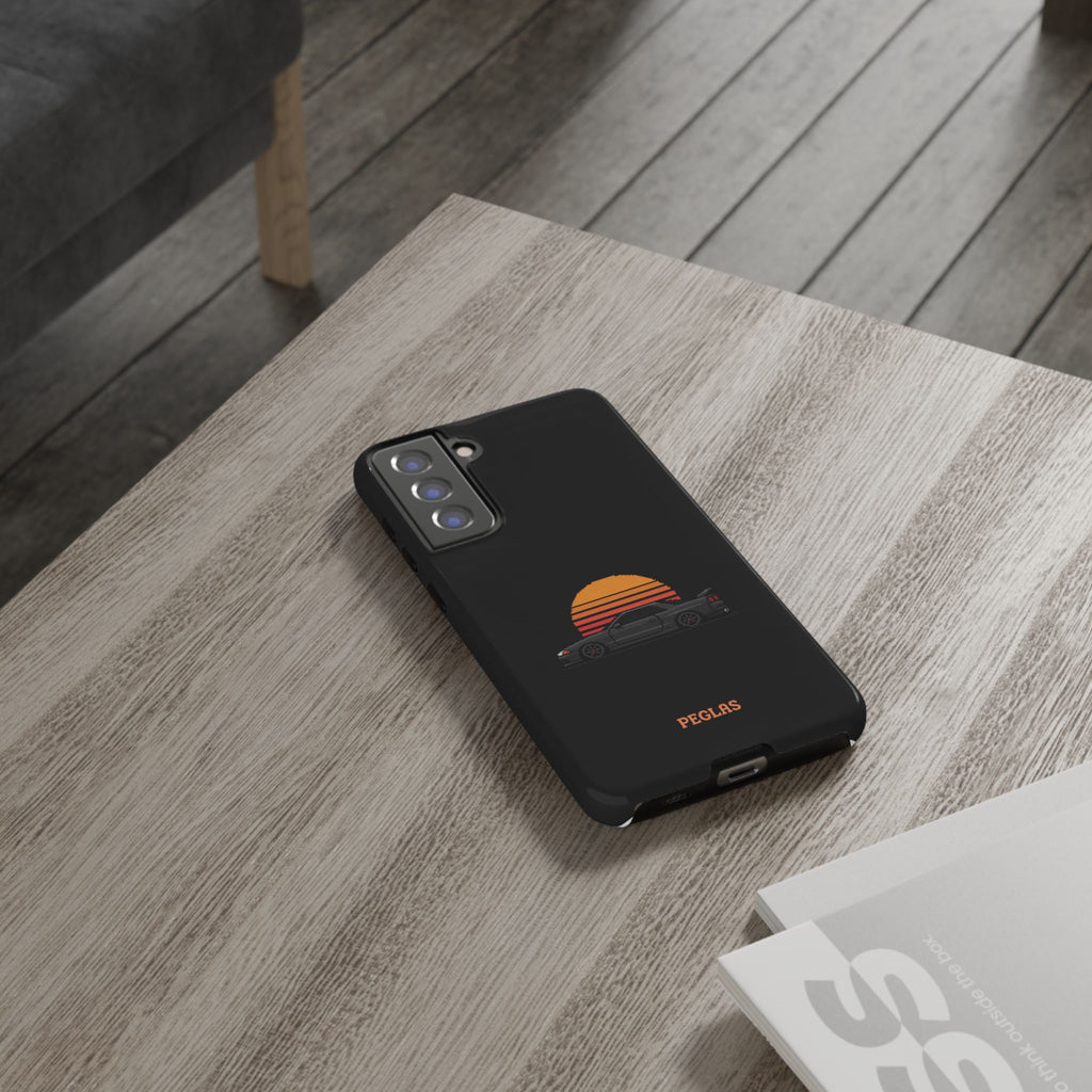 Vintage Black Sports Car Phone Case — Retro Sunset Design
